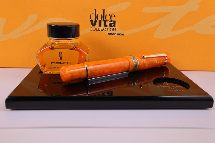 Delta Dolce Vita Oro Oversized Fountain Pen with orange body and black cap